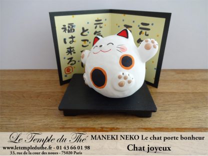 Maneki-Neko Le chat porte bonheur joyeux