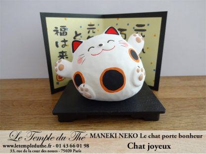 Maneki-Neko Le chat porte bonheur joyeux