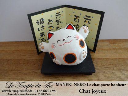 Maneki-Neko Le chat porte bonheur joyeux