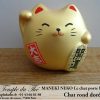 Maneki-Neko Le chat porte bonheur rond doré