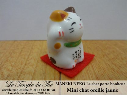 Maneki-Neko Le chat porte bonheur mini chat oreille jaune